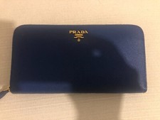 portafoglio prada in pelle saffiano color pervinca 20 cm x 10 cm con scatola ori