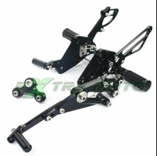 Pedane arretrate regolabili