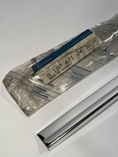 NOS RIGHT SIDE WINDSHIELD TRIM