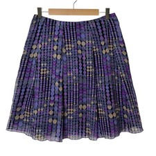 Gonna a pois viola imbevuta di