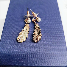 Swarovski orecchini piuma