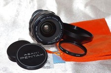 Objectif M42 28mm f3,5 TAKUMAR SMC bouchons, filtre 1A, pare-soleil, housse, TBE