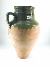 Antica anfora in terracotta smaltata verde con un manico uso in cucina arredo