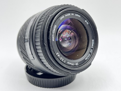 Sigma zoom 70 - sigma, uc