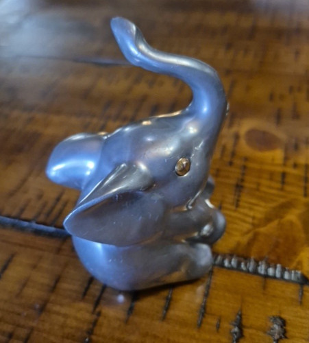 Vintage peltro elefante tronco