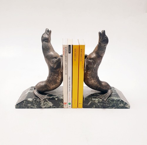 Serre livres sculpture - sculpture, otaries