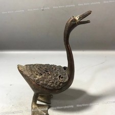 Antica statua anatra in ottone