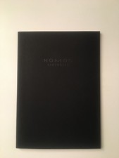 Nomos Gadget quaderno nero con logo 