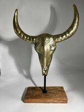 Scultura teschio mucca oro