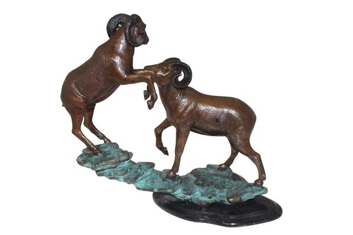 Statua bronzo due - due, su