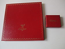 Must de Cartier due scatole vuote foulard e oggetto argento con custodia nera