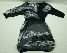 - ABITO DESIGUAL MANICA 3/4