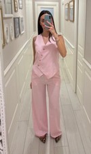 Completo donna con gilet rosa