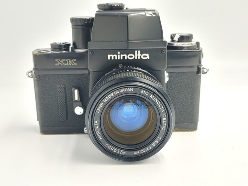 Minolta - or, xm)