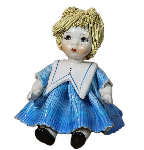 Statuina porcellana capelli