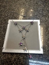 Collana Swatch con pendenti stella in acciaio e pietra viola ns