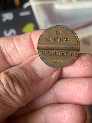 Gettone telefonico 7711 - gettone,