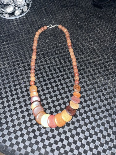 Collana perline legno - in,