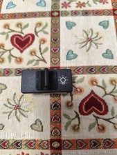 Interruttore pulsante luci