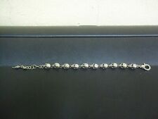 Bracciale Giovanni Raspini motivo teschi in argento