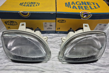 FIAT 600 SEICENTO COPPIA FARI FANALI PROIETTORI ANTERIORI CARELLO ORIGINALI NEW!