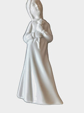 statuina capodimonte; porcellana bianca alt. 12 cm.