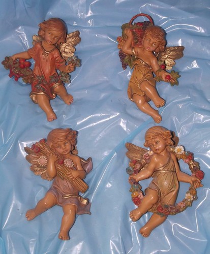 Angioletti stagioni scultore - 4,