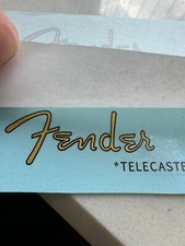 2 pezzi FENDER TELECASTER chitarra paletta trasferimento acquascivolo decalcomanie adesivi oro