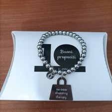 Bracciale elastico con incisione Shopping therapy perle acciaio ciondolo borsa
