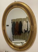 Specchiera Ovale antichizzata col.oro opaco con cornice intagliata decorata