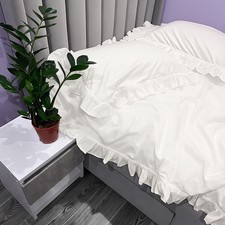 Set lenzuola bianco con volant