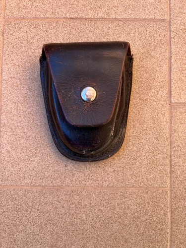 Porta manette pelle - in,