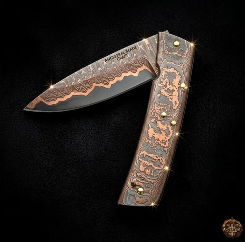 Coltello pieghevole damascato