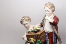 Antica statuina porcellana