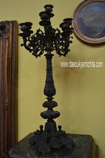 Coppia di antichi candelabri in bronzo