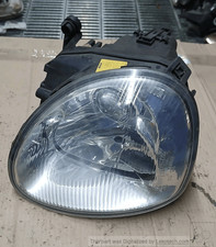 1064138 Proiettore SX FORD SCORPIO (FE) 2.5 TD Ber. 4p/d/2492cc