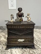 Antico banco meccanico scimmia