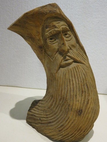 Vecchia statua intagliata - intagliata, a