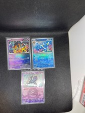 Lotto n°6 tre carte Pokemon POKEBALL Evoluzioni Prismatiche