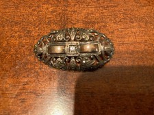 Spilla argento con brillantino. Lavorata. Non punzonata. brillante vero