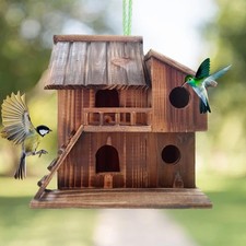 Casetta per uccelli pensile in legno creativa fatta a mano per l'arredamento