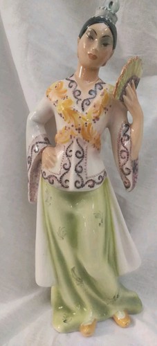 Scultura ceramica - in,