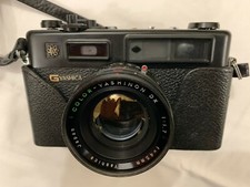 YASHIKA macchina fotografica ELECTRO 35 GT + kit completo lenti e flash