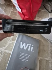 console nintendo wii con giochi incluso fucile e joystick conpresi