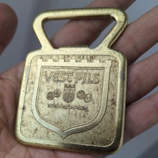 Vecchio apribottiglie Vest
