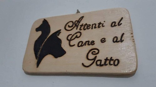 Attenti cane al gatto - attenti,