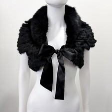 Bolero ritagliato in pelliccia