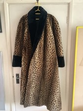 Splendido cappotto a dondolo