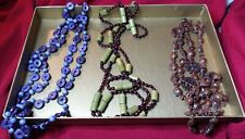 Collane di tipo etnico con semi (veri/sintetici) e perle di legno