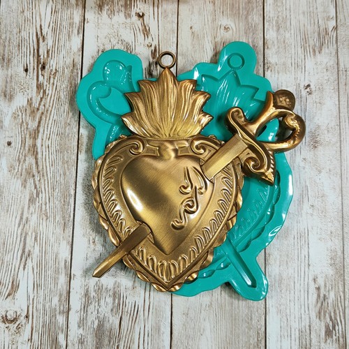 Stampo cuore sacro con - stampo, spada